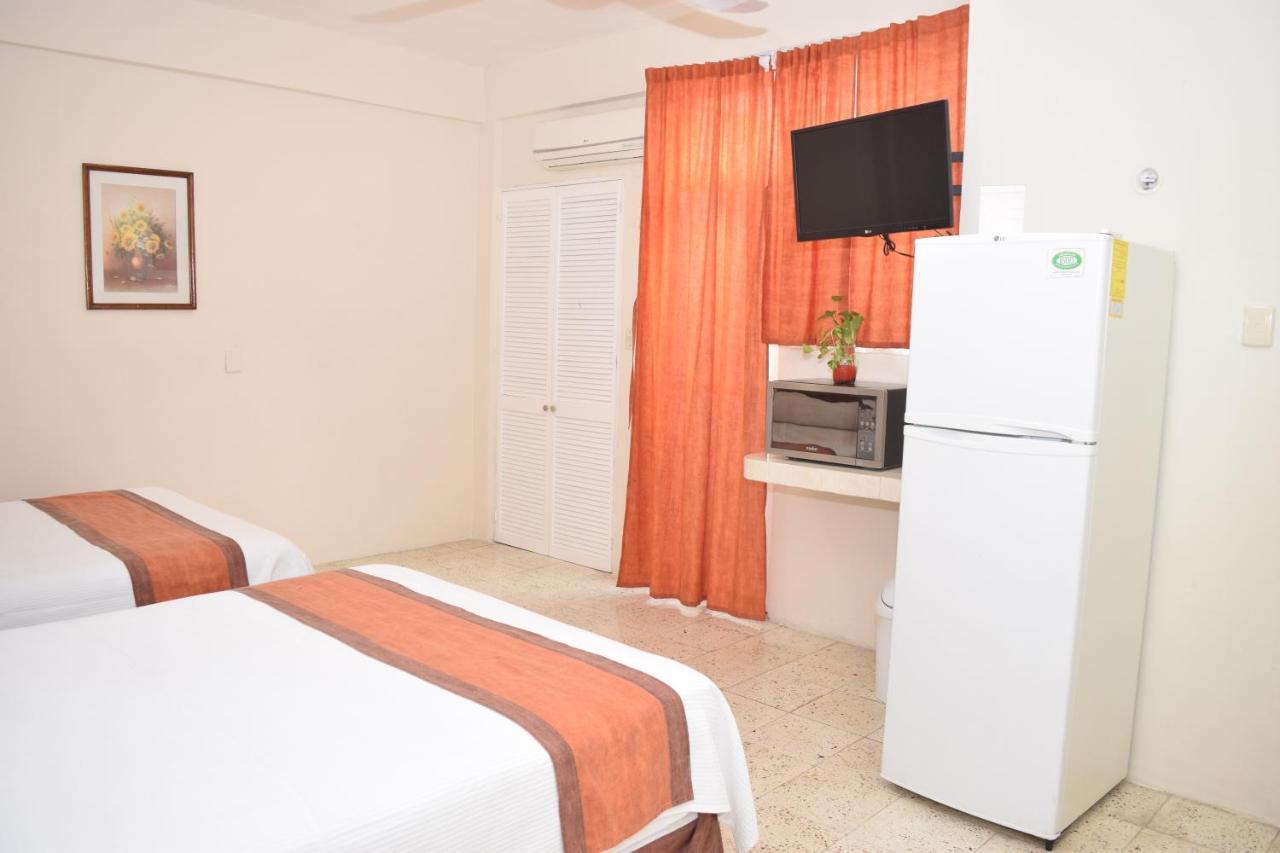 Hotel Suites Le Monde Канкун Экстерьер фото