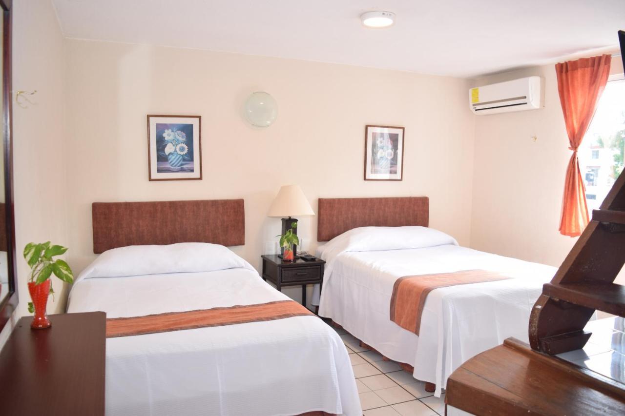 Hotel Suites Le Monde Канкун Экстерьер фото